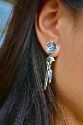 Traditional symbols: Wedding Basket, Bear, and Feathers