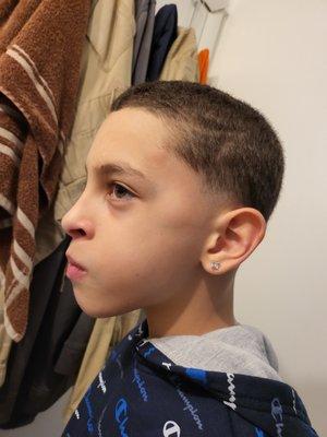 Messed up cut I asked for a #1.5 on top and razor shape up Look how much hair on his head & they insisted it was 1.5, but wouldn't show me