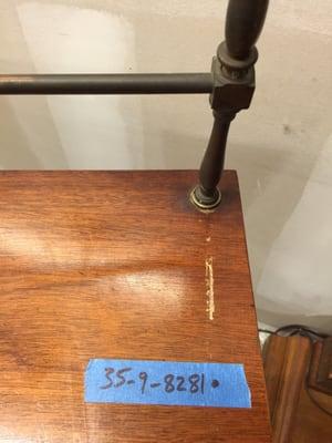 Giant gouge and crushed veneer on auction item from 3-13 auction that was not in the photos or descriptions. Deception is their MO