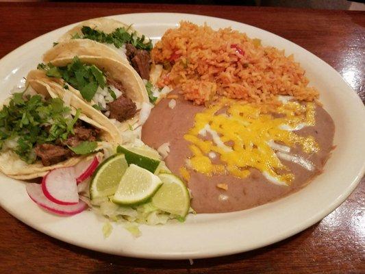 Lengua tacos with rice and beans