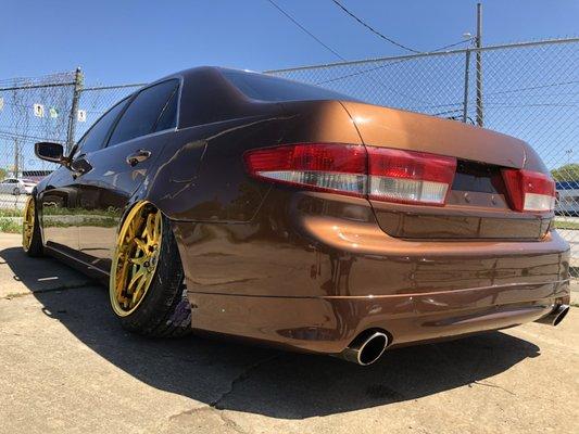 This is a Honda Accord with a custom auto ink color.