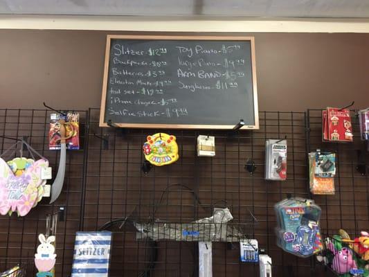 Convenience store items and toys available for travel out to the villages