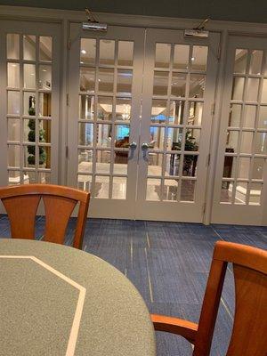 Break room exit leading to the lobby and main entrance.