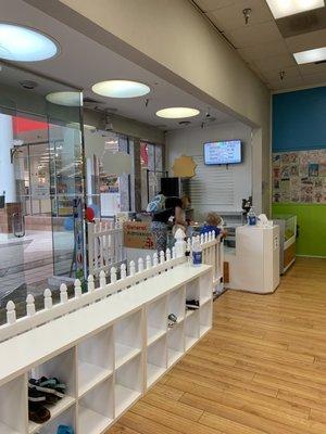 Entrance and shoe rack. Watch out for the glass wall and door...many kids have smashed into them