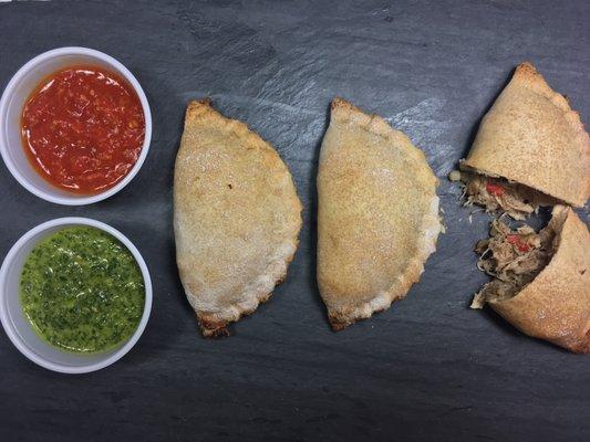 Moroccan Bastillas filled with chicken, couscous, dates, and roasted red peppers.