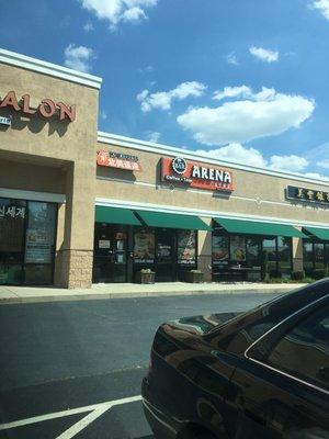 Sits in between the hair salon and Arena Coffee