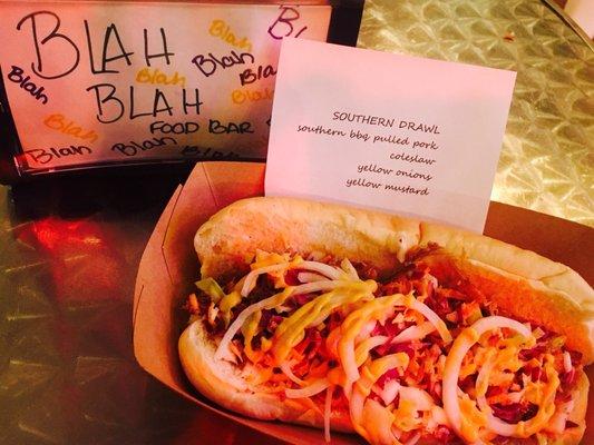 SOUTHERN DRAWL southern pulled pork, coleslaw, yellow onions, & yellow mustard