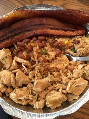 Yellow rice, red beans and chicken breast. Fried plantains added