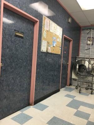 The bulletin board. Info of the area is on there.