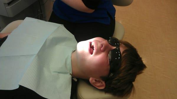 Sun glasses for comfort when they use bright lights during procedures.