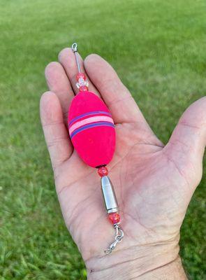 This is the HOT SHOT popping float rig. It features a bright nickel plated repurposed 9mm bullet.