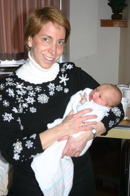 Dr. Jane Piness gets the Peace Sign from our baby!