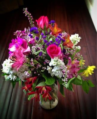 I've never seen so many beautiful flowers jammed into a vase this size from any florist anywhere!