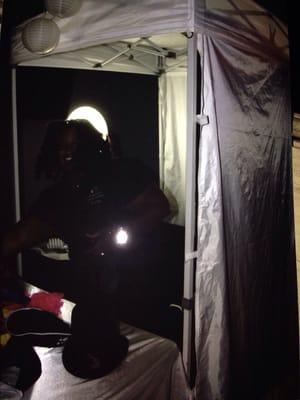 Ronny setting up the booth