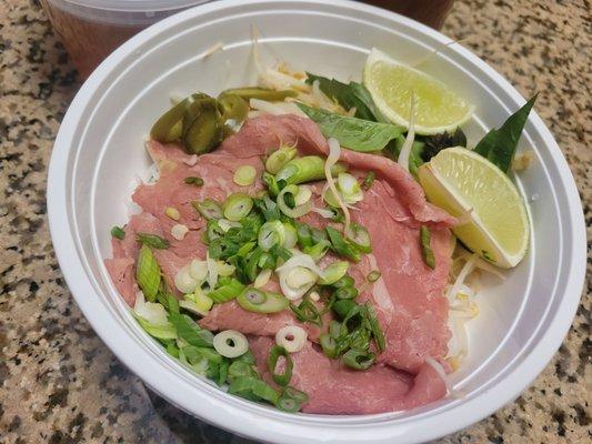 Steak pho, with noodles underneath
