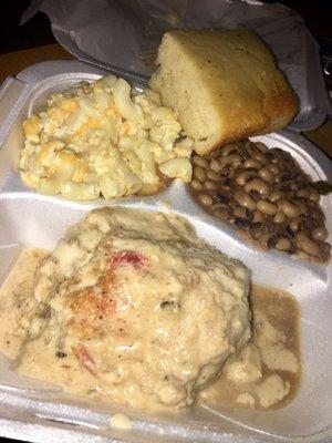 Dressing stuffed chicken breast, Mac and cheese and black eyed peas