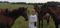 One of our troubled teen students with our beautiful Andalusian therapeutic horses