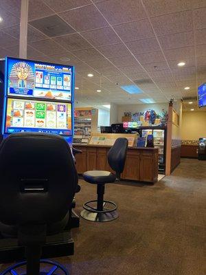 No true bar, 6 slot machines total and a 2 separate tables.