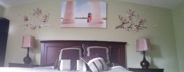 Beautiful steel and ceramic wall piece, designed/installed by Spector Studios (cherry blossom branches w/flowing petals).