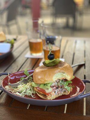 Fresh Mahi Sandwich accompanied by an Overboard IPA