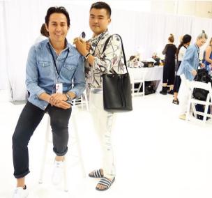 Octavio back stage reporting for AskMen.com at NY Fashion Week