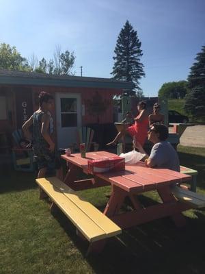 Friends relaxing out front with the big chair!