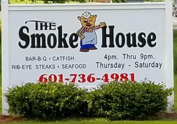Sign of The Smoke House.
