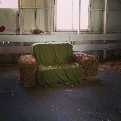 Biodegradable loveseat in the garage at Di Bufala Dairy