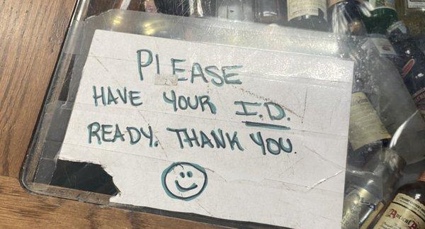 This sign says ID not Drivers license.