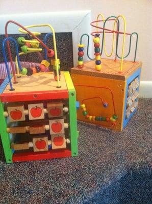 Toys and movies for kids in the waiting room.