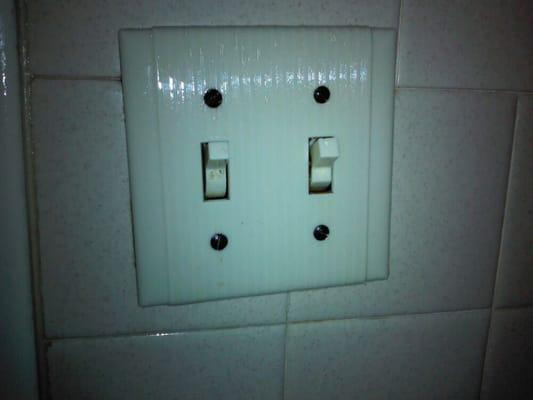 Bathroom light switch after I cleaned it