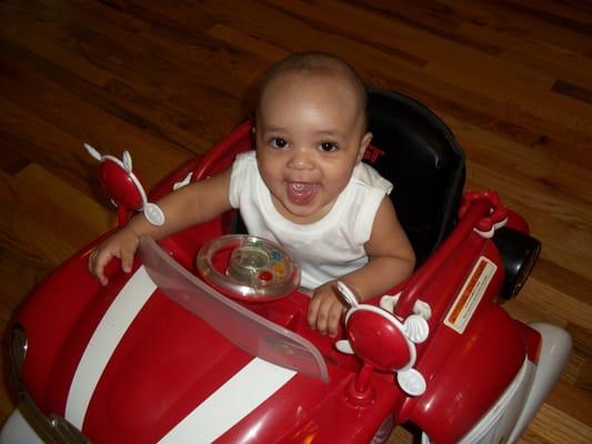 Playing in his walker!!