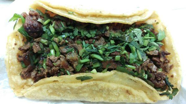 Steak taco, only cilantro. Double tortilla, lots of well seasoned meat, no fatty pieces. Yum!