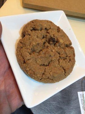 Some kind of raisin cookie with walnuts.