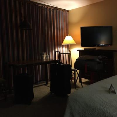 The table in front of the picture window making opening/closing difficult. (ADA room in Tamarack.)