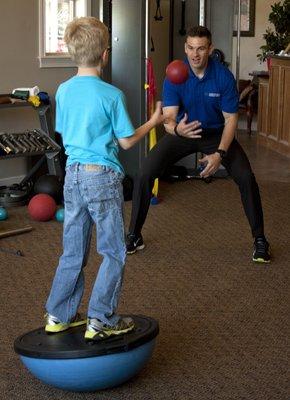 Brett helping a patient.