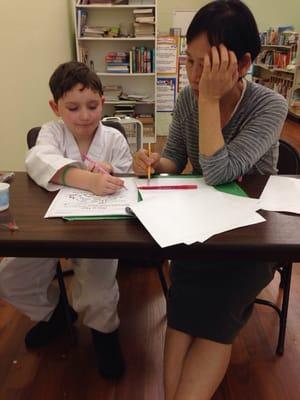 Sharon tutoring my Little boy