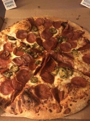 Hand, pepperoni, jalapeno.