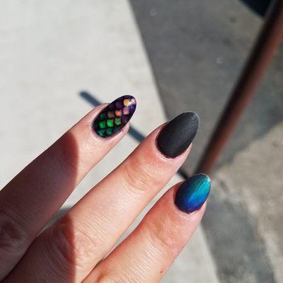 Mood color of the mood rings come see jamie ......Ps Excuse the sloppiness it is hard to do ur own nails