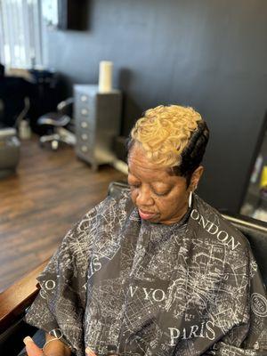 Short, relaxed hair.