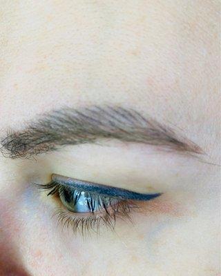 Black ink on ash brown hair and so far above my natural brow it does not look natural at all