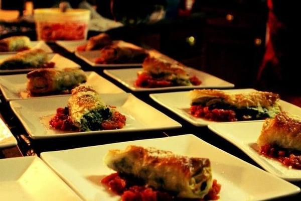Spinach & Feta Phyllo Rolls over Fresh Marinara