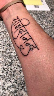 The Prizm Tattoo team were so kind and helpful! A great experience all around!!!! (This is my fresh tattoo, a phrase written in sanskrit).