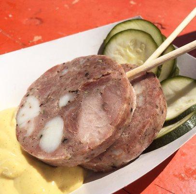 Porksicle with pickles and white wine mustard