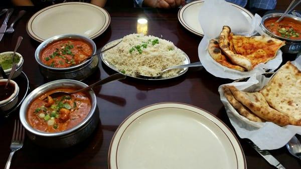 Chicken tikka masala, huge shrimp tikka masala, mahi mahi tikka masala, spicy and kashmiri naan. What a yummy feast!!