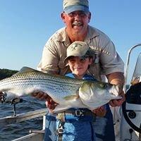 Jim and a young fisherman with a great catch!