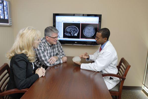 Dr. Dagnew meeting with patients.