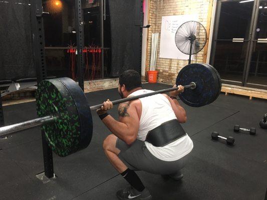 Back squats, exercise, strength training, powerlifting, cross training, HIIT, small group training, gym floor