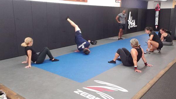 Coach Jake teaching the class basic ground movements.