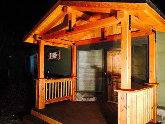 Covered front entry added to enhance home